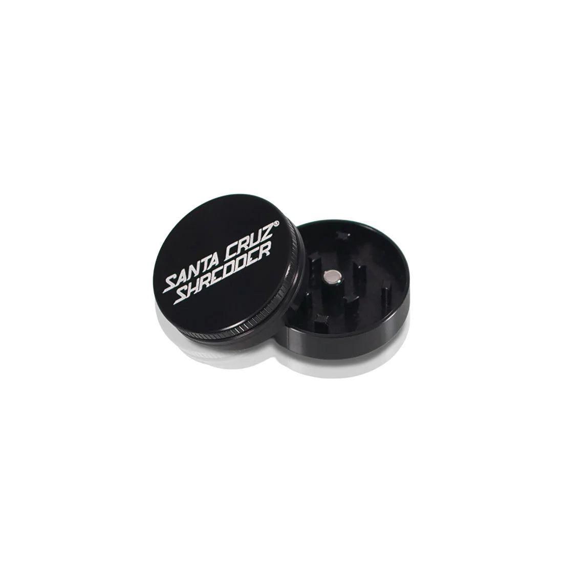 opened view of the 2 Piece Santa Cruz shredder grinder in black. A precise product with a secure rare earth magnet for confidence when rinding herb.