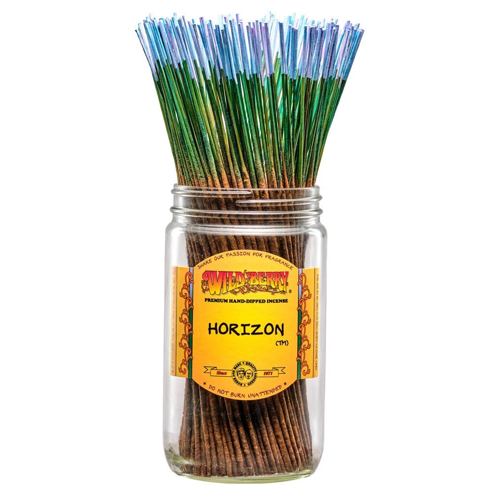 front view of the green and blue stalks of the incense sticks from Wild Berry. giving the smells of crisp mountain air, soft cedarwood, and nots of citrus.