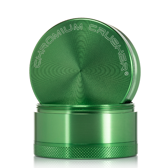 front view of the chromium crusher 2.2" 4 piece grinder. premium and sturdy grinder for botanical herb in green.