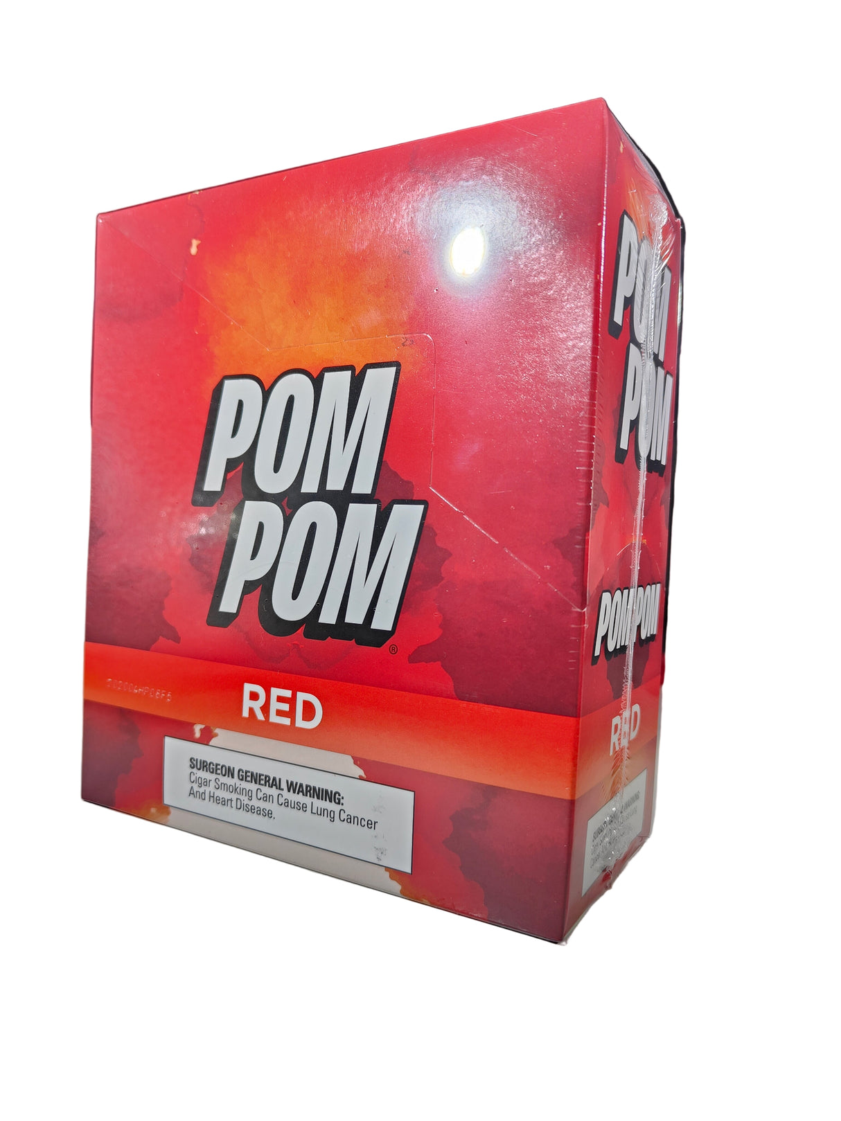 Angled overhead view of the Pom Pom Red cigarillos box in classic red and white. These machine-made cigarillos come in a wholesale 15-count box of 3-packs, providing a smooth, quick smoke ideal for retail counter displays.