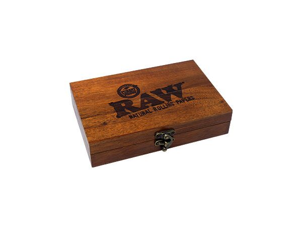 Top down view of the RAW double six dominoes set in a natural wood finish box featuring the classic red RAW logo. This 28-piece premium game set comes in a durable storage case, making it the perfect collectible accessory for game nights and smoke sessions.