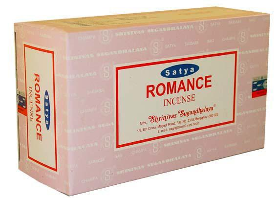 Front view of the Satya Incense 15g 12-Count Display box in the Romance variant featuring bright pink highlights. This combustible agarbatti stick display unit is ideal for vertical counter placement to drive impulse checkout transactions.