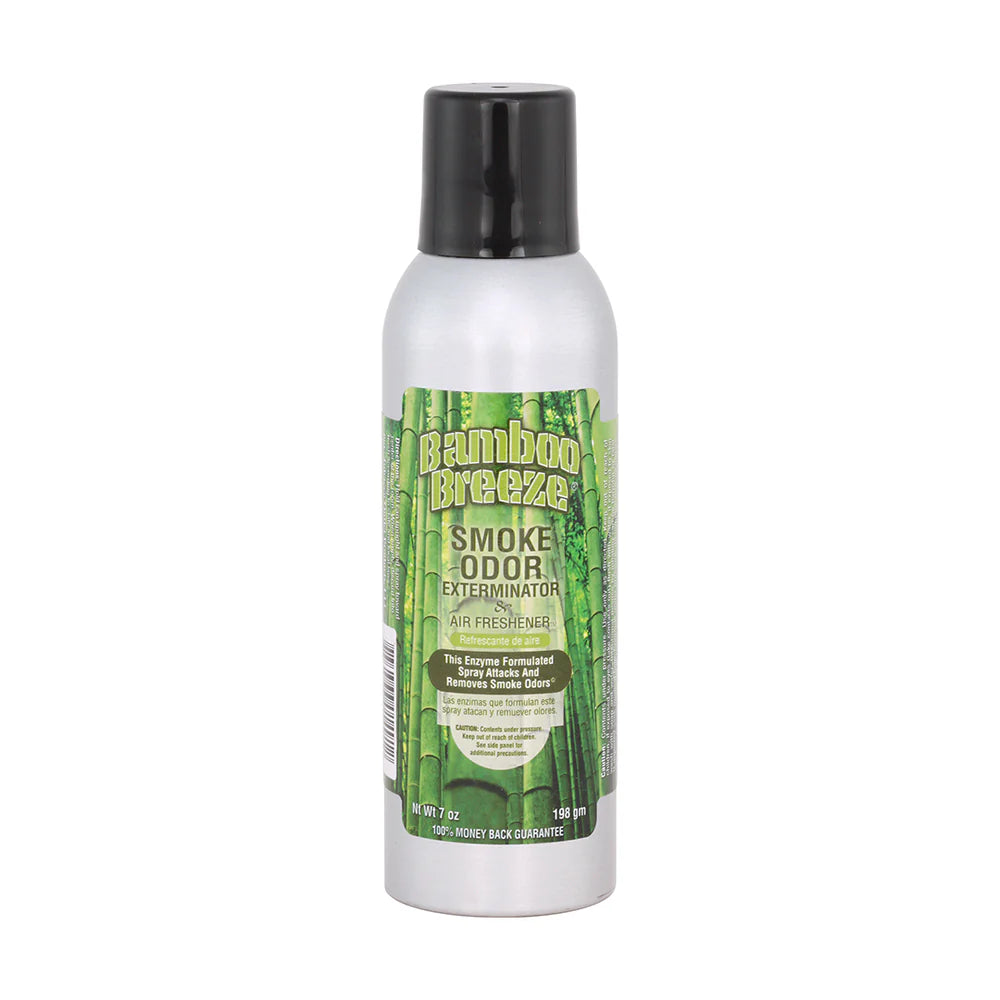Front view of the Smoke Odor Exterminator Air Freshener 7oz in a green bamboo breeze design. This aluminum aerosol canister features an active enzyme formula that physically binds to and neutralizes airborne smoke and environmental smells.