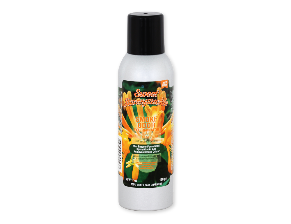Front view of the Smoke Odor Exterminator Air Freshener 7oz in a green and orange sweet honeysuckle design. This aluminum aerosol canister features an active enzyme formula that physically binds to and neutralizes airborne smoke and environmental smells.