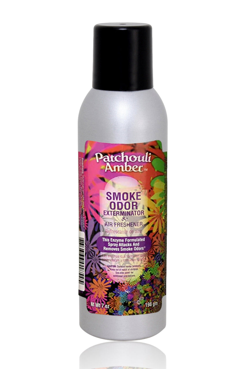 Front view of the Smoke Odor Exterminator Air Freshener 7oz in an amber and brown Patchouli Amber design. This aluminum aerosol canister features an active enzyme formula that physically binds to and neutralizes airborne smoke and environmental smells.