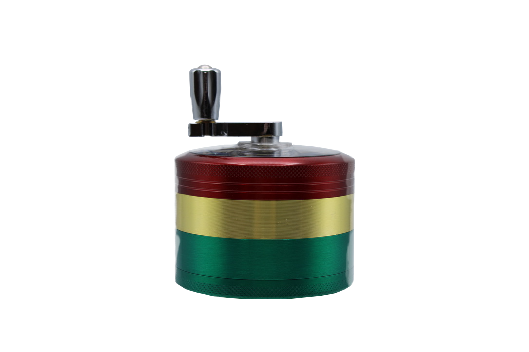 side view of the click it large rasta hand cranked grinder in the unique rasta colors. made for consistent grinding results.