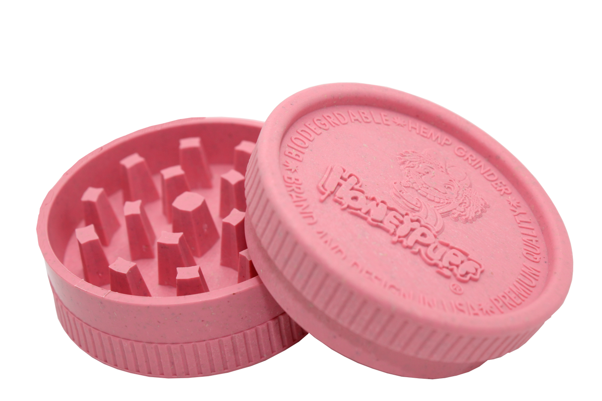 side open view of the Honeypuff 56mm Biodegradable pink hemp grinder. A eco friendly grinder that is durable while being compact for everyday use.