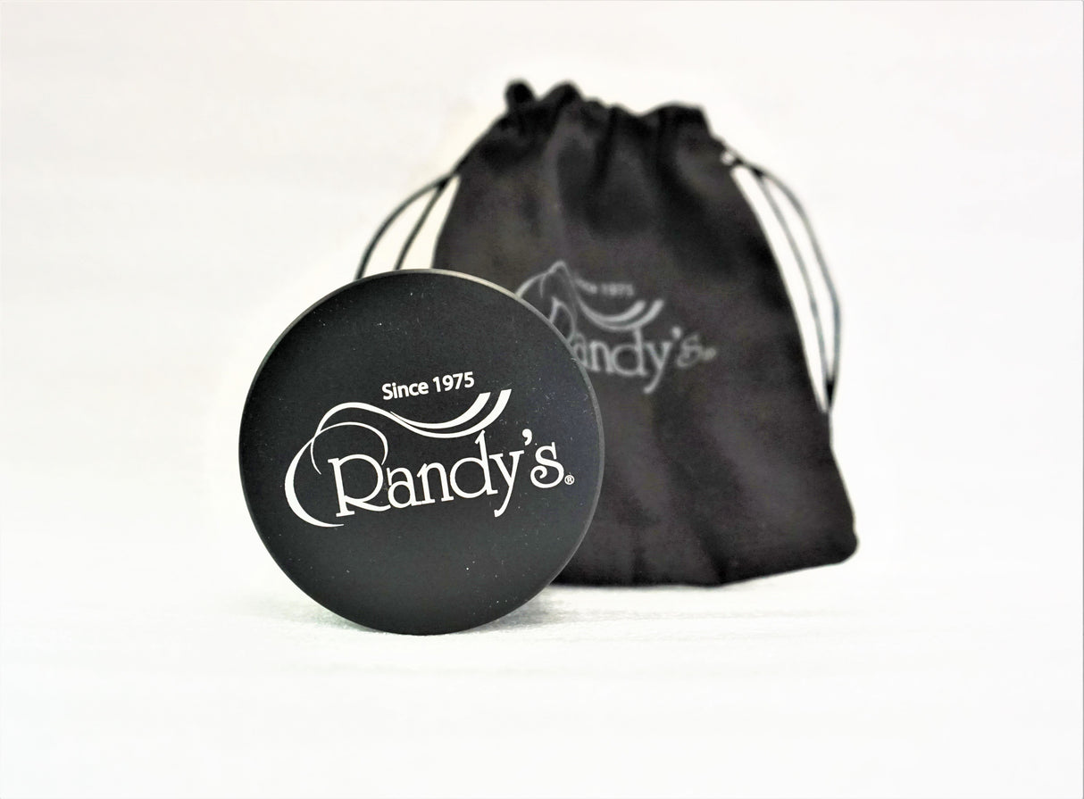 View of the Randy's 63mm Revolution Grinder and storage bag. A quality herb grinder from the Randy's brand