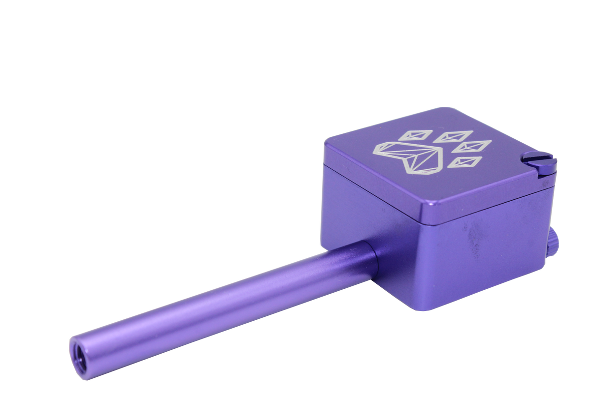 side view of the wolf grinders cannon hand pipe, made of machines aluminum with a swivel cover to carry flower ready. A purple anodized finish that is durable for long term use.