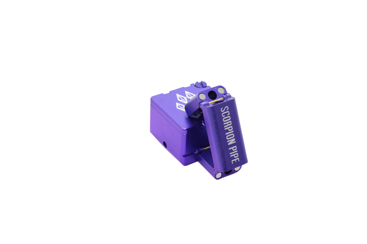 view of the wold grinders scorpion folding hand pipes. made of aircraft grade aluminum with a quartz bowl for performance smoking in a compact package finished in purple. able to be folded for carry and storage.