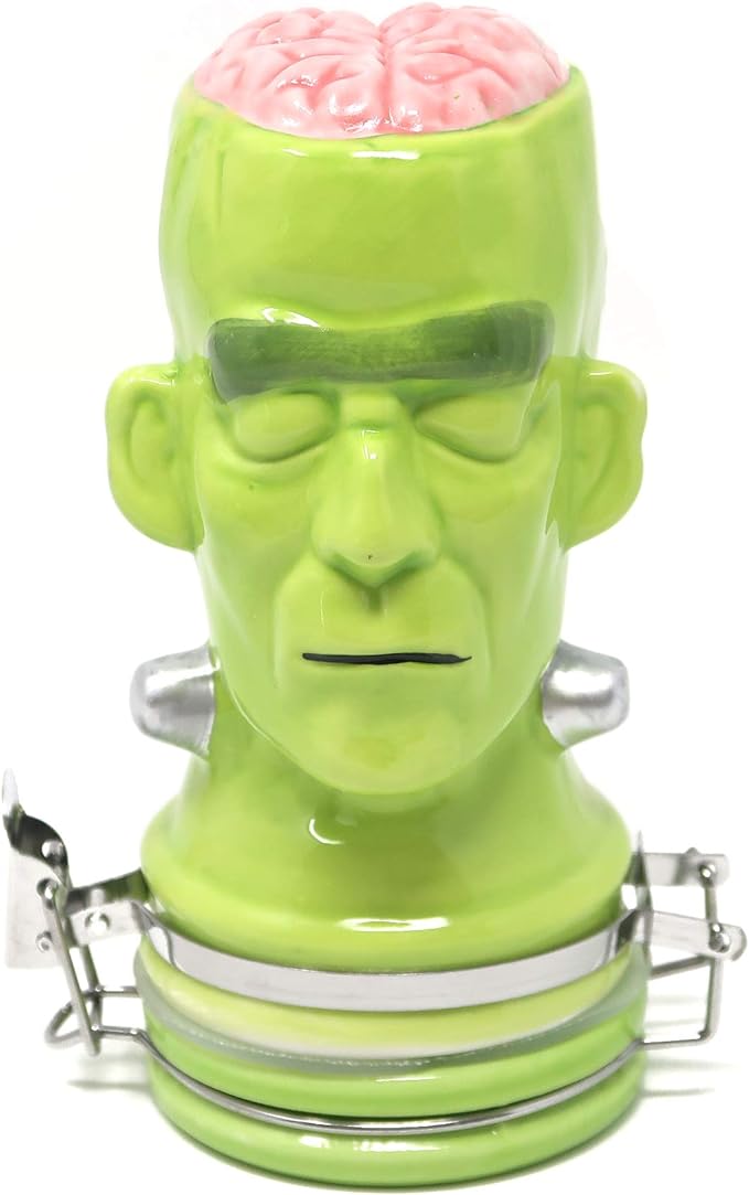 Front view of the Contained Art 250ml ceramic frankenstein jar in green with vibrant printed artwork. This premium airtight container perfectly preserves the freshness of larger batches of dry herbs while completely blocking out harmful UV light.