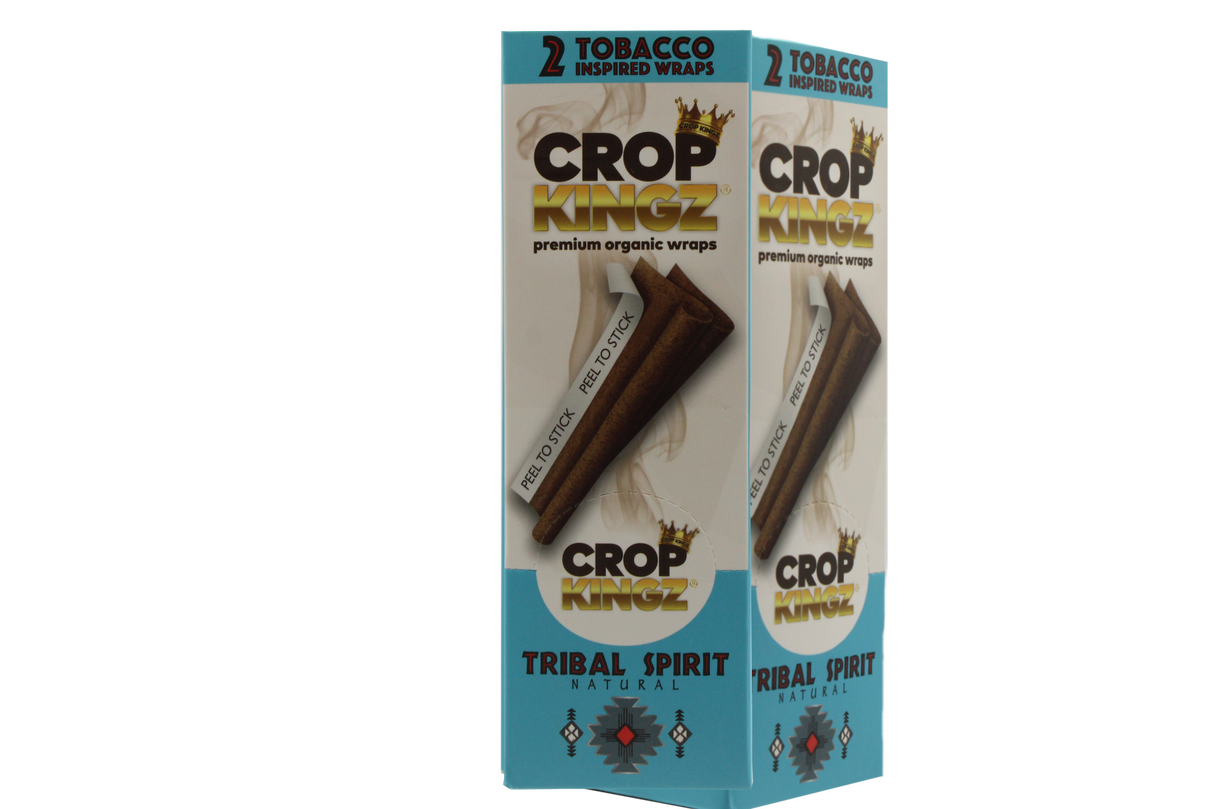 Front angled view of the Crop Kingz Tobacco Inspired Wraps 15-count display box in blue and white packaging. Made from 100% organic hemp, these tobacco-free wraps mimic the rich flavors of traditional blunts and feature an innovative self-sealing strip.