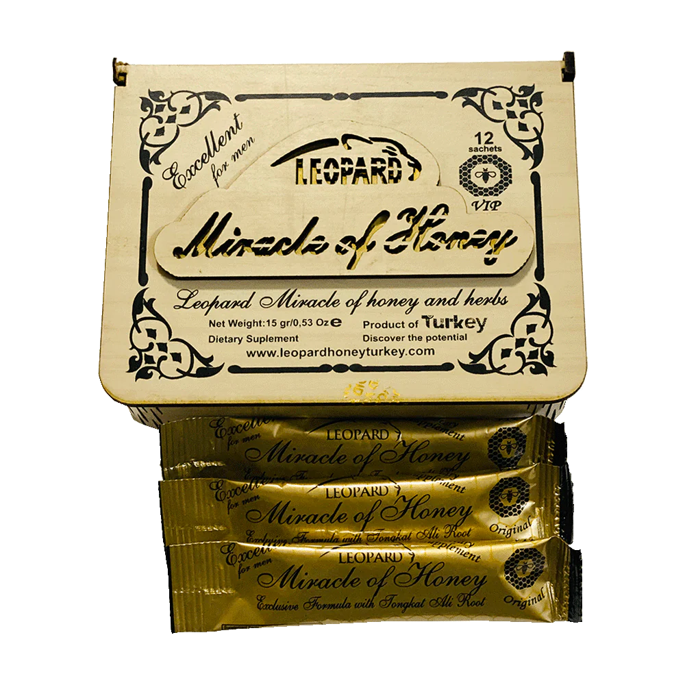 Angled overhead view of the Leopard Miracle Royal Honey retail display box featuring matching black, gold, and leopard print artwork. This professional wholesale countertop display container holds multiple individual honey sachets for convenient presentation and dispensing in retail environments.