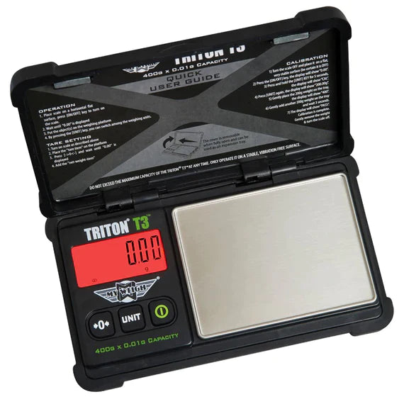 Front angled view of the MyWeigh Triton T3 digital scale in rugged black and silver. This heavy-duty pocket scale features a high 400g maximum capacity and ultra-precise 0.01g readability for accurately measuring botanical herbs while withstanding accidental drops.