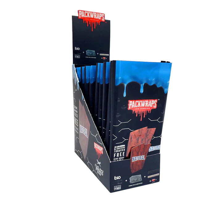 Front angled view of the Packwraps Twisted Hemp Wraps 10-count display box in black and blue packaging. Produced in collaboration with Packwoods, these tobacco-free, slow-burning hemp wraps include a reusable glass tip and a Pro Packer XL tool for a premium rolling experience.