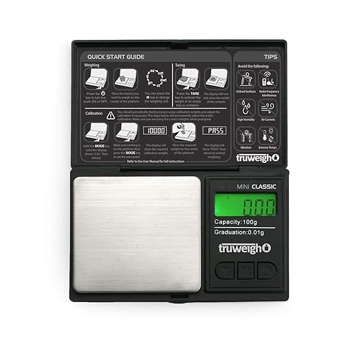 Front angled view of the Truweigh Mini Classic digital scale in sleek black. This ultra-compact pocket scale features a 100g maximum capacity and an ultra-precise 0.01g readability for accurately measuring fine botanical herbs and solid concentrates.