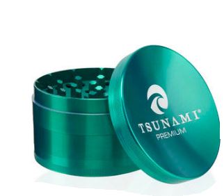 Front view of the Tsunami 100mm sunken top herb grinder in sleek green. This extra-large, premium aluminum grinder features a unique bowl-shaped top perfect for conveniently mixing and rolling your dry herbs.