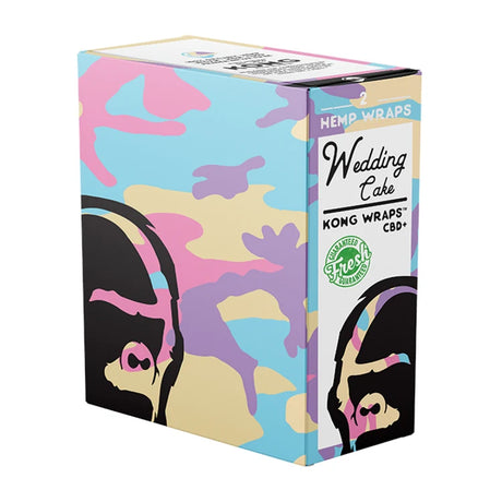 A box of Wedding Cake Hemp Wraps CBD by Kong Wraps, featuring a colorful pastel camouflage pattern with stylized black-and-pink illustrated faces on the sides.