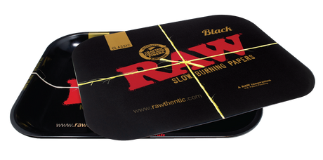 Side view of the RAW black rolling tray cover. a metal magnetic cover for your RAW rolling tray.