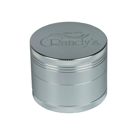 side view of the Randy's Revolution 4 piece grinder in silver. a aluminum premium grinder with sharp teeth that will shred and fluff your herb consistently.