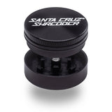 opened view of the 2 Piece Santa Cruz shredder grinder in black. A compact grinder for smokers who need to save on space but not on quality.