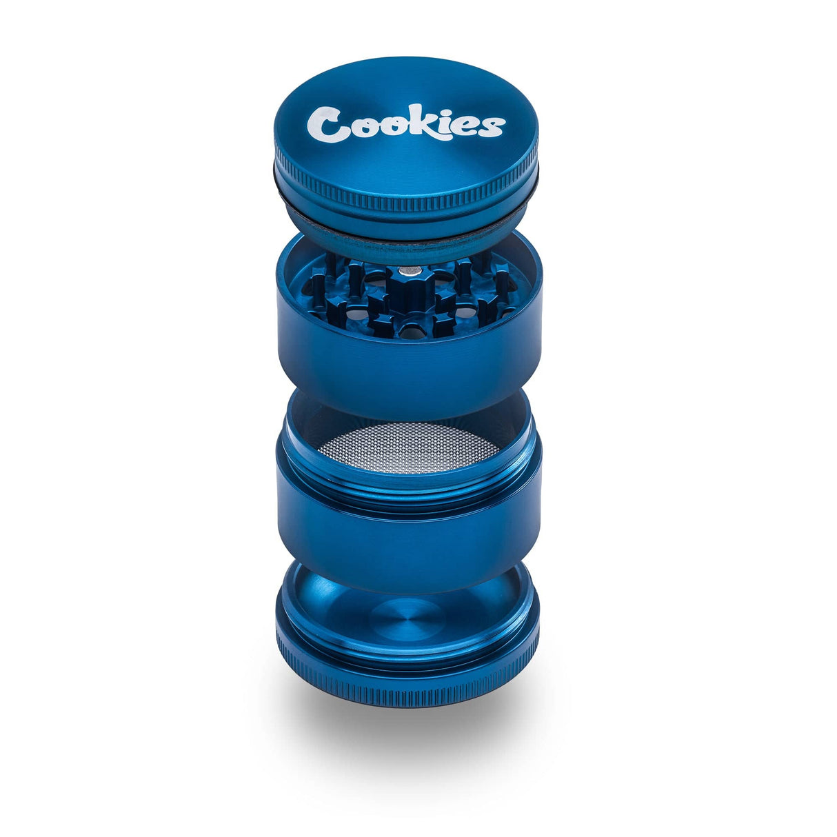 Exploded view of the Santa Cruz Shredder and Cookies collab herb grinder. The popular aluminum grinder paired with the street style brand cookies.