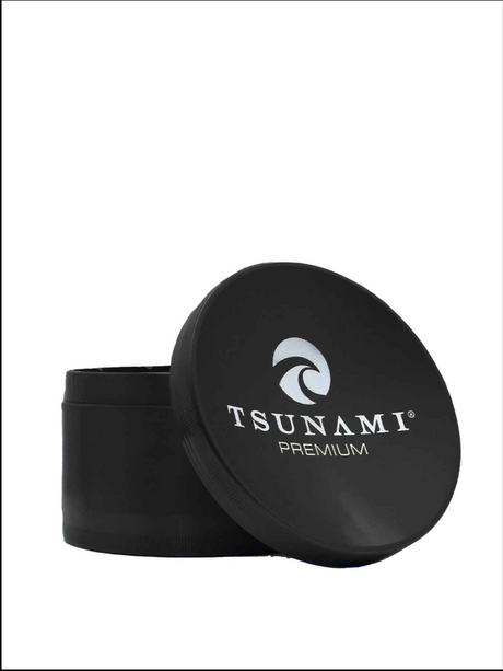 Side view of the Tsunami premium grinder showcasing its concave top, made with precise made aluminum construction in a black finish.