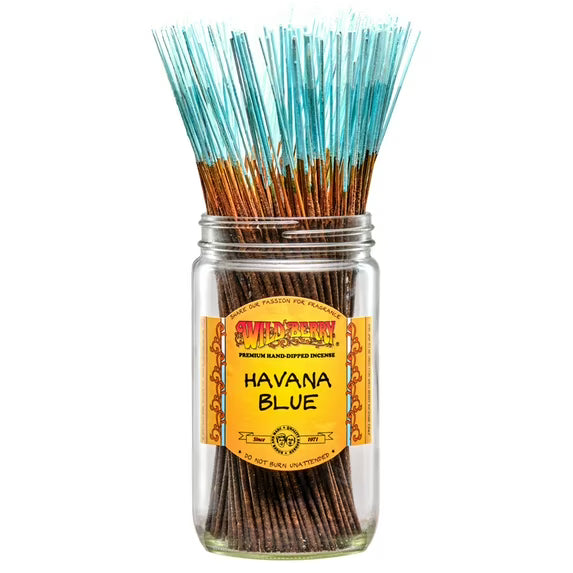 front view of blue stemmed Wild berry Havana Blue. A product with bright tones of orange and bergamot with warm smells of cedarwood. 