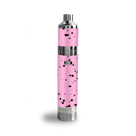 front view of the Yocan Evolve Plus XL in a pink black splatter. A premium Yocan wax vaporizer with the features of a full dabbing station that fits in your palm.