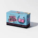 Front view of the Blazy Susan Magnetic Resin Blaster Scrubber retail box in the brand's signature pink. This dual-magnetic architecture pairs an external control handle with an internal scrubbing unit to mechanically scrape tar from hard-to-reach water pipe chambers.