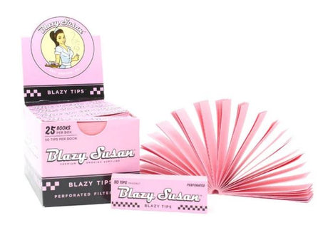 Front angled view of the naturally dyed pink Blazy Susan Filter Tips in a 25-count retail display carton. These pre-scored cardstock tips provide a rigid structural base for manual rolling and physically block loose botanical debris.