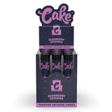Front view of the Cake Terpene Infused Cones 12-count display carton in the blue Blueberry Cookies flavor. These ultra-thin pre-rolled paper wraps are physically saturated with natural botanical terpenes to introduce specific aromas and are housed inside rigid glass tubes.