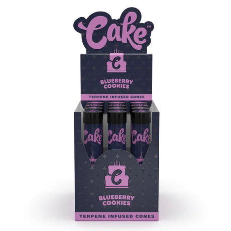Front view of the Cake Terpene Infused Cones 12-count display carton in the blue Blueberry Cookies flavor. These ultra-thin pre-rolled paper wraps are physically saturated with natural botanical terpenes to introduce specific aromas and are housed inside rigid glass tubes.