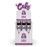 Front view of the Cake Terpene Infused Cones 12-count display carton in the purple Purple Punch flavor. These ultra-thin pre-rolled paper wraps are physically saturated with natural botanical terpenes to introduce specific aromas and are housed inside rigid glass tubes.
