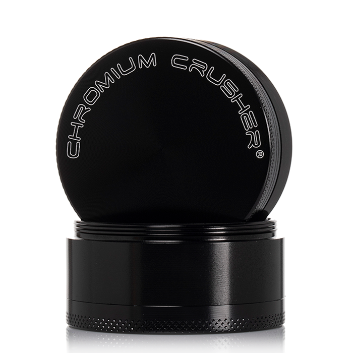 front view of the chromium crusher 2.2" 4 piece grinder. premium and sturdy grinder for botanical herb in black.