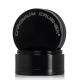 front view of the chromium crusher 2.2" 4 piece grinder. premium and sturdy grinder for botanical herb in black.