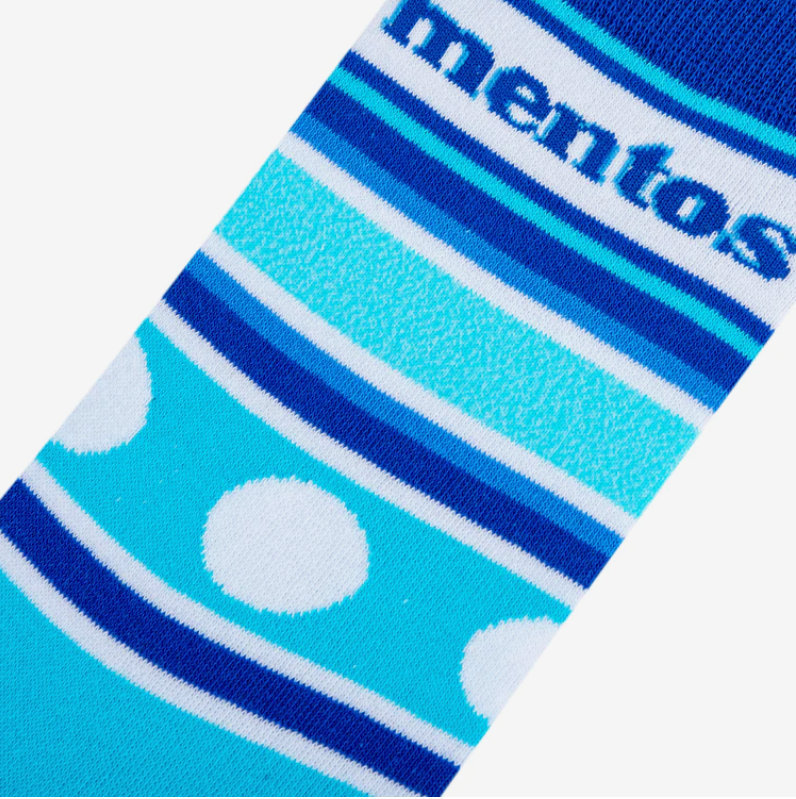 Overhead flat lay view of the Crazy Socks Mentos Men's Crew socks in signature blue and white stripes. These novelty crew socks feature the classic Mentos logo and are built with moisture-wicking technology to keep feet cool and dry.