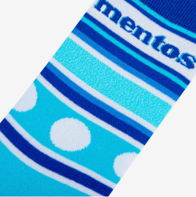 Overhead flat lay view of the Crazy Socks Mentos Men's Crew socks in signature blue and white stripes. These novelty crew socks feature the classic Mentos logo and are built with moisture-wicking technology to keep feet cool and dry.
