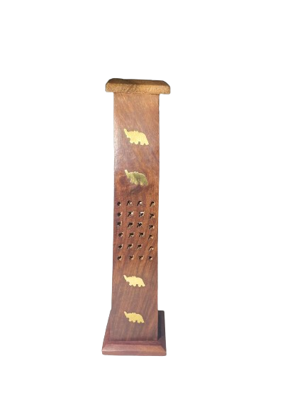 Front angled view of the Elephant Design Standing Incense Holder in natural brown wood with brass accents. This upright rectangular tower features geometric exhaust cutouts and inlaid brass elephant silhouettes to provide a contained burning platform that prevents surface ash accumulation.