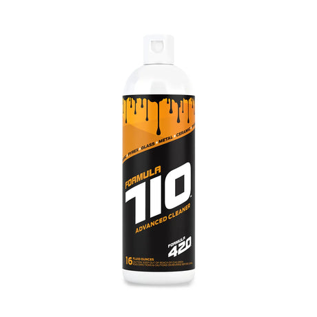Front view of the Formula 710 Advanced Liquid Pipe Wash bottle in clear plastic with a vibrant black, blue, and yellow label. This heavy-duty cleaning solution is specifically formulated to instantly dissolve sticky wax and oil buildup from glass concentrate rigs and quartz bangers.