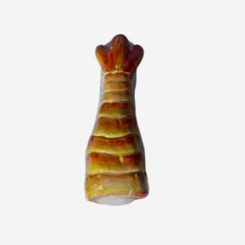 Alternate angled view of the 5-inch Glizzy Ceramic Tail Hand Pipe in. Designed to visually replicate a sculpted aquatic ocean tail, this novelty pipe features a built-in deep-dish bowl and an ergonomic grip profile along the tail fins.