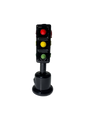 Front angled view of the 5-inch Glizzy Ceramic Traffic Light Pipe in opaque black. Designed directly after a classic intersection signal, this novelty pipe features an integrated ceramic basin for processing unrefined botanical materials.