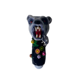 Front angled view of the 5-inch Glizzy Ceramic Wolf Hand Pipe in grey. Designed to visually replicate a poly-faceted canine predator, this novelty pipe features an integrated ceramic basin for processing unrefined botanical materials.