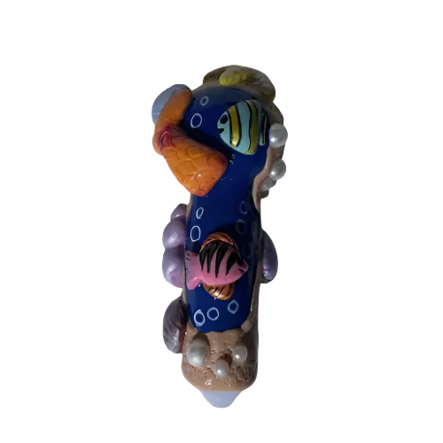 Front angled view of the 5-inch Glizzy Sea World Ceramic Pipe featuring an ocean-inspired blue and coral design. This novelty hand pipe utilizes a high-density fired clay construction that serves as a heat-resistant barrier to actively dissipate thermal exhaust.