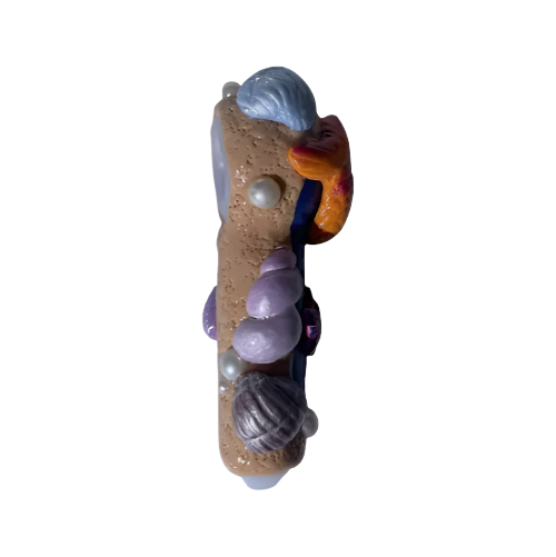 Front angled view of the 5-inch Glizzy Sea World Ceramic Pipe featuring an ocean-inspired blue and coral design. This novelty hand pipe utilizes a high-density fired clay construction that serves as a heat-resistant barrier to actively dissipate thermal exhaust.