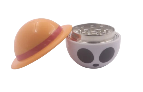 Close-up angled view of the internal cutting chamber inside the 2.6-inch Logia Devil UFO Herb Grinder. The geometrically arranged, razor-sharp metal teeth are engineered to smoothly shred dense herbs into a consistent, fluffy texture.