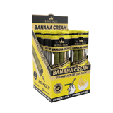 Front angled view of the King Palm Flavored Slim Rolls 20-count display box in bright yellow packaging. Hand-rolled from natural leaves, these tobacco-free slim cones feature a squeeze-and-pop terpene flavor bead in the filter for an enhanced smoking experience.
