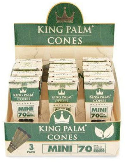 Front angled view of the King Palm Pre-Rolled Cones Mini 70mm 15-count display carton in standard green, black, and gold packaging. These all-natural, tobacco-free palm leaf wraps feature a pre-installed corn husk filter and arrive ready to pack for a smooth draw without the need to roll.