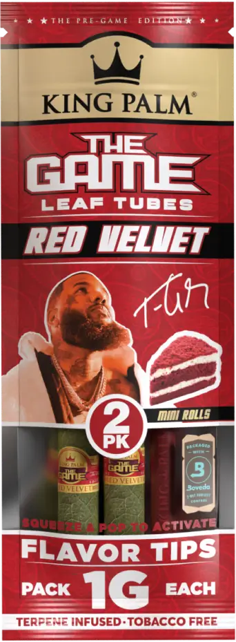 Angled overhead view of a single 2-pack pouch of King Palm The Game Red Velvet Mini Cones highlighting the exclusive wrapper artwork. This premium, tobacco-free natural palm leaf cone features a squeeze-to-pop corn husk filter that infuses every hit with rich chocolate and vanilla flavors.