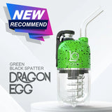 Angled front view of the Lookah Dragon Egg Electric Dab E-Rig in standard green with classic black splatter design lines. This capsule-style portable e-rig features a unique bottom-mounted water bubbler and a magnetic cap to deliver cool, smooth, and filtered concentrate hits on the go.